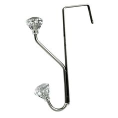 a metal hook with two glass balls hanging from it's end, on a white background