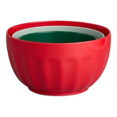 a red bowl with green inside on a white background