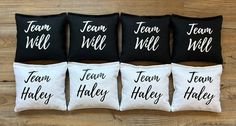 four black and white pillow cases with the words team wild, team haley, team will