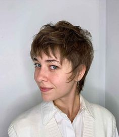 20 Trendiest Pixie Mullet Ideas Taking Over 2023 Pixie Wolf Cut, Shaggy Pixie Mullet, Feminine Mullet, 70 Hair, Very Short Bangs, Mullet Hair, Pixie Mullet, Shaggy Pixie