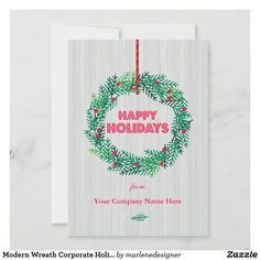 a holiday card with the words happy holidays written in red and green wreaths on it