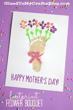 a handprint flower bouquet on a purple background with the words happy mother's day