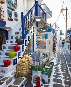 an alleyway with many items on display