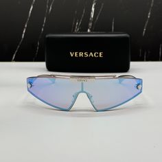 Condition: New With Full Package Brand: Versace Model: Ve2265 1000/11 Frame Color: Silver Lens Color: Grey, Blue/Pink Frame Material: Metal/Acetate Size: 120 Made In Italy Included: Authentic Eyewear, Certificate Of Authentic, Cleaning Cloth, Case, Box. Next Or The Same Business Day Shipping. Brand New With Full Package Authentic Eyewear With Certificate Silver Rimless Shield Sunglasses With Mirrored Lenses, Luxury Clear Shield Sunglasses With Gradient Lenses, Luxury Silver Sunglasses With Uv Protection, Luxury Silver Shield Sunglasses With Gradient Lenses, Luxury Silver Sunglasses With Uva Protection, Luxury Silver Shield Sunglasses With Polarized Lenses, Designer Silver Sunglasses With Uv Protection, Pink Frame, Versace Accessories