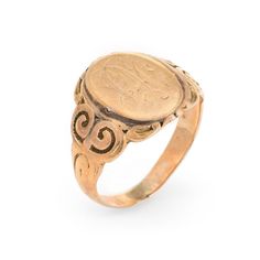 This is part of Chairish’s Fine Jewelry assortment.  Lovely antique Victorian signet ring (circa 1880s to 1900s), crafted in 10 karat rose gold.   The centre oval is inscribed yet due to wear we are unable to decipher the letters.   The side shoulders feature a pretty swirling design that terminates to the oval mount. The saddle of the ring is low and allows the ring to sit flat on the finger.     The ring is in good condition with patina and wear evident. We tend not to clean our antique pieces Formal Oval Rings With Historical Design, Formal Oval Ring With Historical Design, Victorian 14k Gold Engraved Ring For Ceremonial Occasions, Victorian 14k Gold Intaglio Engraved Ring, Victorian 14k Gold Engraved Collectible Ring, Victorian Engraved Yellow Gold Ring, Victorian 14k Gold Engraved Ring, Vintage 14k Rose Gold Jewelry, Victorian Style Gold Engraved Ring