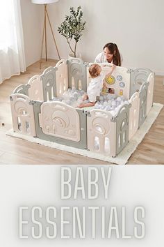 the baby essentials playpen is shown in two different colors and features an elephant theme