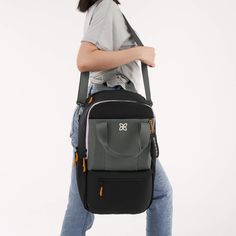 A Sherpani best-seller, our newly updated Camden backpack now has even more to love! This backpack is made for all-day adventures with a large capacity to handle those “just in case” items. Made from recycled material, the Camden features three water bottle holders, a padded laptop sleeve and a luggage pass through. The perfect personal item for air travel, the Camden is sure to be your new travel favorite! Functional Outdoor Travel Bag With Removable Pouch, Functional Backpack With Luggage Sleeve, Functional Travel Bag With Removable Pouch For Outdoor, Functional Travel Backpack For On-the-go, Functional Laptop Backpack, Large Capacity Laptop Backpack For Outdoor, Versatile Outdoor Travel Backpack, Functional On-the-go Duffle Bag Backpack, Versatile Travel Backpack For Outdoor Activities