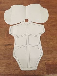 paper cut out to look like a bodysuit