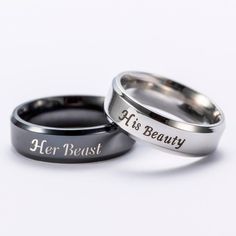 two wedding rings with the words his beauty and her beast engraved on each one side