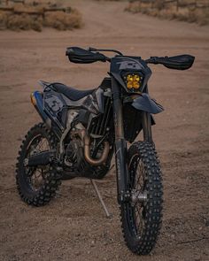 a dirt bike is parked in the middle of nowhere