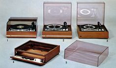 three different types of turntables in wooden cases with glass inserts on top