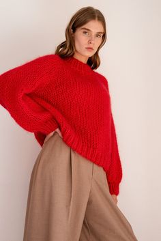 "The Relaxed Mohair Sweater is skillfully hand knitted in our premium Italian mohair blend. Lightweight yet super warm, it is the perfect cozy layer for winter. Designed for a relaxed fit, this sweater is so flattering and comfortable, you'll never want to take it off. It has an oversized and slightly cropped shape with a classic mock neck and raglan sleeves. Handcrafted in Greece. DETAILS * Super soft, premium quality Italian mohair * Composition: 60% kid mohair, 40% microfiber * Hand wash in c Red Mohair Sweater, Chunky Red Sweater, Oversized Crew Neck Knitting Pattern, Oversized Crew Neck Hand Knitted Pattern, Casual Red Mohair Sweater, Red Chunky Knit Turtleneck Sweater, Oversized Red Knit Sweater, Red Knit Pattern For Fall, Red Knit Fall Knitting Pattern