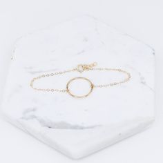 "14K karma gold bracelet - Solid Gold Bracelet, 14k delicate bracelet ★ Circle charm is 14k solid gold, it is about 17mm ★ The chain and all components are 14K solid yellow gold It comes with a 1/2\" extension chain. (If you order a 6\" bracelet, it will be a 6\" bracelet plus 1/2\" extension.) Please read our policies before you place your order. https://www.etsy.com/shop/SashJewelry/policy?ref=shopinfo_policies_leftnav To see other Mother daughter necklace set click here: https://www.etsy.com/ Gold Circle Bracelets For Everyday, Dainty Adjustable Circle Bracelets, Gold-tone Round Gold Bracelet With Solid Link, Adjustable Gold Circle Bracelets, Gold-tone Solid Link Round Bracelet, Mother Daughter Necklaces Set, Other Mother, Karma Bracelet, Mother Daughter Necklace