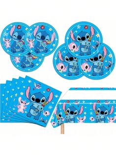 a set of tableware and napkins with cartoon character characters on blue paper plates