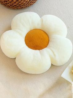 two pieces of bread sitting on top of a table next to an egg and banana