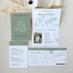 the wedding stationery is laid out on a table