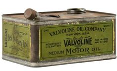 an old tin can with the label for valvoine oil on it's side