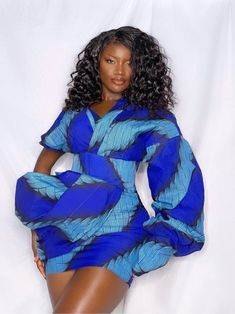 The cinched waist is designed to be worn comfortably on the waist to accentuate your figure. The sleeves and back of the dress are designed to be slightly oversized for an ultra-feminine and slouchy look. Blue African Print, Social Event, African Traditional Dresses, African Print Fabric, African Print Fashion, Almost Perfect, Asymmetrical Design, Dress Material, Cinched Waist