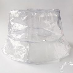 a clear plastic bag sitting on top of a white table