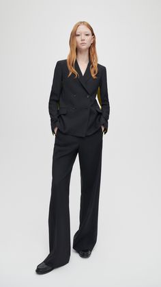 Offering sharp, elegant tailoring separates in both formal and casual styles, Paul Smith women's trouser suits come in an array of textures and tones, including check, pinstripe and the crease-resistant 'A Suit To Travel In'.