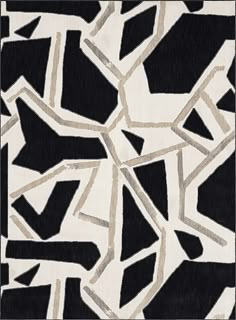 a black and white rug with geometric shapes