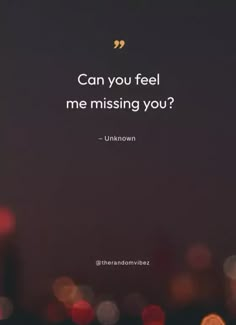 a blurry cityscape with the words can you feel me missing you?