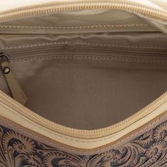 This beautiful waist pack features stunning hand-tooled leather paired with gorgeous buttercream leather. The ample interior has a zippered pocket, with zipper top close. The adjustable waist belt is in matching durable woven canvas. An amazing piece you'll cherish! Materials: soft genuine leather Item Width 16in Item Depth 4.5in Item Height 5in color: light camel/ creamish (think homemade vanilla ice cream lol) Leather Belt Bag With Zipper Closure In Beige, Beige Leather Belt Bag With Zipper Closure, Beige Leather Pouch Belt Bag, Beige Leather Shoulder Bag With Zipper Pouch, Leather Bum Bag, Jewlery Earrings, Homemade Vanilla Ice Cream, Romper And Jacket, Homemade Vanilla