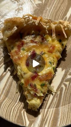 a piece of pizza with cheese and vegetables on it