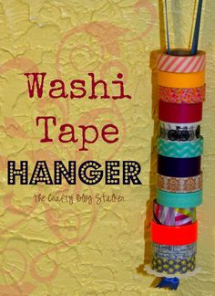 washi tape hanging on a yellow wall with the words washi tape hanger