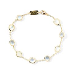 This 18k yellow gold IPPOLITA ROCK CANDY bracelet comes in a soft-focus colorway that produces a pearlescent glow in the light. White moonstone and rock crystal, join doublets of rock crystal and mother-of-pearl as well as triplets of mother-of-pearl layered above and beneath faceted rock crystal. The bezels vary in form, creating an intriguing visual mix. 18k Yellow Gold Gemstones: White Moonstone, Rock Crystal, Mother-of-Pearl Style #: GB1181FLIRT Mother Of Pearl Bracelet, Dark Amethyst, Candy Bracelet, Gold Chain Bracelet, 18k Gold Bracelet, 18k Gold Chain, Engagement Ring Guide, White Moonstone, Gold Confetti