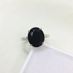 PRODUCT INFO : Stone : Natural Black Spinel Stone size : 10X12 MM / 8x10 MM Metal type : Sterling silver (92.5) Approximate weight : 3.25 grams ADDITIONAL INFO : ~ Every product consist of 925 stamp. ~ If you want same product in different Stone / Plating ( gold and rose gold) / different Metal (14 k - 18 k gold ) , feel free to contact me . ~ If you are in rush and want your pretty jewelry pieces early , we can sent it to express service with extra shipping cost of 15 -20 $ ~ Since we use natur Spinel Stone, Black Spinel Ring, Green Amethyst Ring, Spinel Ring, August Birthstone, Ring Stacking, Pretty Jewelry, 925 Silver Ring, Ring Oval