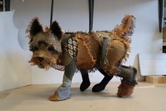 an animal made out of clothes and shoes