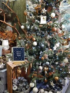 a decorated christmas tree in a store