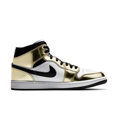 The Air Jordan 1 Mid SE ‘Metallic Gold’ is the perfect sneaker to add some luxury to your style. The white leather upper is contrasted by metallic gold overlays and black hits on the Swoosh and collar, creating a look that will turn heads. With Jumpman iconography woven into the tongue tag and classic Wings logo stamped on the lateral collar flap, this mid-top sneaker has all of the details covered. And don’t forget about the encapsulated Nike Air cushioning in the heel – it ensures a comfortabl Wing Logo, Perfect Sneakers, Jordan Model, Air Jordan 1 Mid Se, Nike Air Jordan 1 Mid, Gold Sneakers, Mid Top Sneakers, Jordan Sneakers, Sneakers Adidas