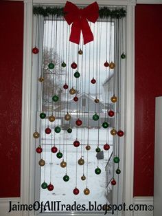 a christmas tree made out of ornaments in front of a window with the words, great idea