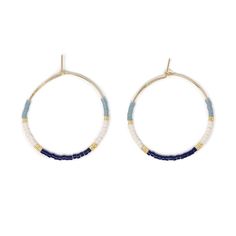 - PROVIDES A FAIR WAGE FOR TALENTED ARTISANS IN NICARAGUA - A PORTION OF PROCEEDS DONATED TO EDUCATION PROGRAMS IN NICARAGUA Introducing our NEW Seed Bead Hoops! This new fun style is available in a variety of our Wildflower Colors, just perfect for fall. Made with gold filled wire, our Hoops are high quality and affordable. All our earrings are handmade in Nicaragua by women for fair wages. Each piece is signed by the artisan who made it so that you can get to know more about the person you are Blue Small Hoop Beaded Earrings For Summer, Blue Beaded Hoop Earrings For Summer, Seed Bead Flower Hoop Earrings, Everyday Blue Beaded Hoop Earrings, Everyday Colorful Beaded Hoop Earrings, Beaded Hoops, Silver Wire, Seed Beads, Gold Filled