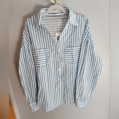 Blue & White Striped Ecowish V-Neck Long Sleeve Button Down Shirt. There Is A Very Small Pink Dot Next To One Of The Corners Of The Right Pocket. See Pictures For Spot Light Blue Buttoned V-neck Blouse, Striped V-neck Top With Buttons, Striped V-neck Tops With Button Closure, Blue V-neck Shirt For Daywear, Striped Tops Women, Pink Dot, Cuffed Top, Ruffle Sleeve Blouse, Purple Blouse