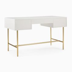 a white desk with gold legs and drawers