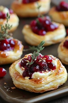 Image showcasing delicious Cranberry Brie Puff Pastry Bites, a perfect appetizer for festive gatherings, featuring melted brie and cranberry filling, highlighted for holiday parties. Christmas Appetizers Brie Bites, Brie Wreath Appetizer Puff Pastry, Cranberry Bites Brie, Cranberry Pecan Brie Bites, Cranberry Baked Brie Puff Pastry, Christmas Brie Bites, Brei Cranberry Bites, Gluten Free Cranberry Brie Bites, Cranberry Brie Cups Appetizer