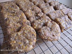 some cookies are cooling on a wire rack