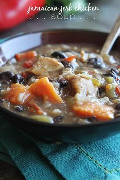 a close up of a bowl of soup on a table