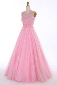 a pink dress on a mannequin with beadings and sequins