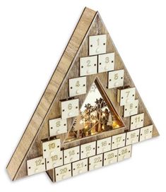 a triangle shaped wooden clock with white numbers on the front and sides, all in different shapes and sizes