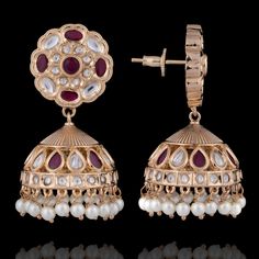 South Indian inspired pair reflecting traditional vibe for an ethnic look! A trendy pair of jhumki earrings flawlessly embellished with kundan and ruby stones - an ideal pick to add charm to your stunning everyday attire. Gold-plated on high-quality brass as base metal. Approximate earrings length is 2". In-stock & ready-to-ship. *Please Note: We use faux stones and beads in all of our jewelry. Fusion Style Kundan Jhumkas, Kundan Fusion Jhumkas, Fusion Kundan Jhumkas Drop Earrings, Bollywood Style Ruby Jhumkas With Intricate Design, Bollywood Style Ruby Chandbalis With Latkans, Ruby Bollywood Jhumkas For Festivals, Bollywood Ruby Jhumkas For Festive Occasions, Bollywood Ruby Jhumkas For Festivals, Ruby Chandbali Earrings With Latkans