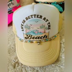 Otto Trucker Hat , Sand / White Chain Is Detachable! White Trucker Hat For Beach Season Vacation, Yellow Trucker Hat For The Beach, Spring Beach Trucker Hat In Beige, Summer White Trucker Hat For Beach, Bohemian Snapback Trucker Hat For Summer, Lightweight Snapback Trucker Hat For Beach, Spring Beach Beige Trucker Hat, Trendy Yellow Trucker Hat For The Beach, Beige Trucker Hat For Spring Beach Outings