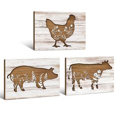 three pieces of wood with farm animals on them