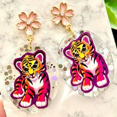 Lisa Frank Tiger Acrylic Sticker Earrings For Sale! These Earrings Are Absolutely Adorable. They Are Handmade By Me With Resin. Each Earring Has An Original Lisa Frank Sticker Embedded In It. They Are About 2 1/2 Inches Tall And About 1 1/2 Inches Wide. They Are From My Boutique, And Are Absolutely Cute And One Of A Kind! Fun Pink Earrings For Pierced Ears, Pink Resin Drop Earrings, Lisa Frank Tiger, Sticker Earrings, Acrylic Sticker, Lisa Frank Stickers, Earrings For Sale, Lisa Frank, Art Craft