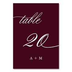 the table number is shown in white on a maroon background