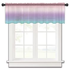 a window with a purple and blue ombreed valance hanging from it's side