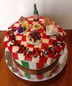 a birthday cake that is on top of a table